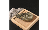 Ammonite Form Sculpture Brass-Toned Ammonite Form Ornament Textured Spiral Conch Figurine for Bookshelf, Tea Table