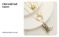 Boho necklace with boots, ox head, crescent charms.
