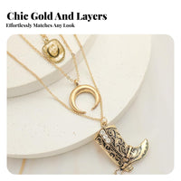 Boho necklace with boots, ox head, crescent charms.